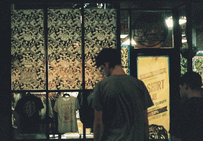 111 storefront with repeating pattern in windows